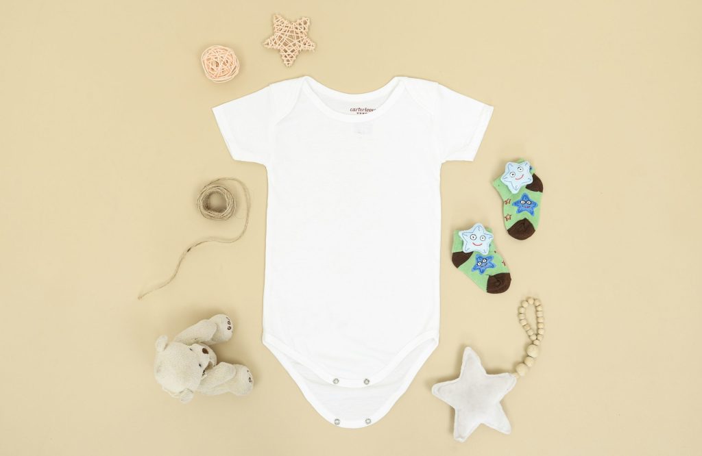 Baby onesie decorating activity idea for baby shower.